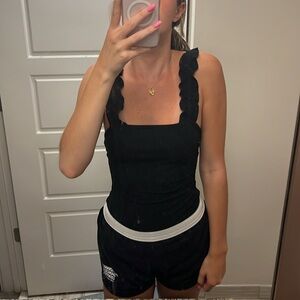 LELIS BLACK RUFFLE BODYSUIT
